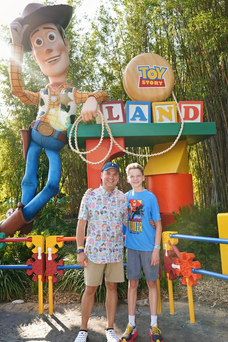 Andrew and Michael at Toy Story Land with Woody