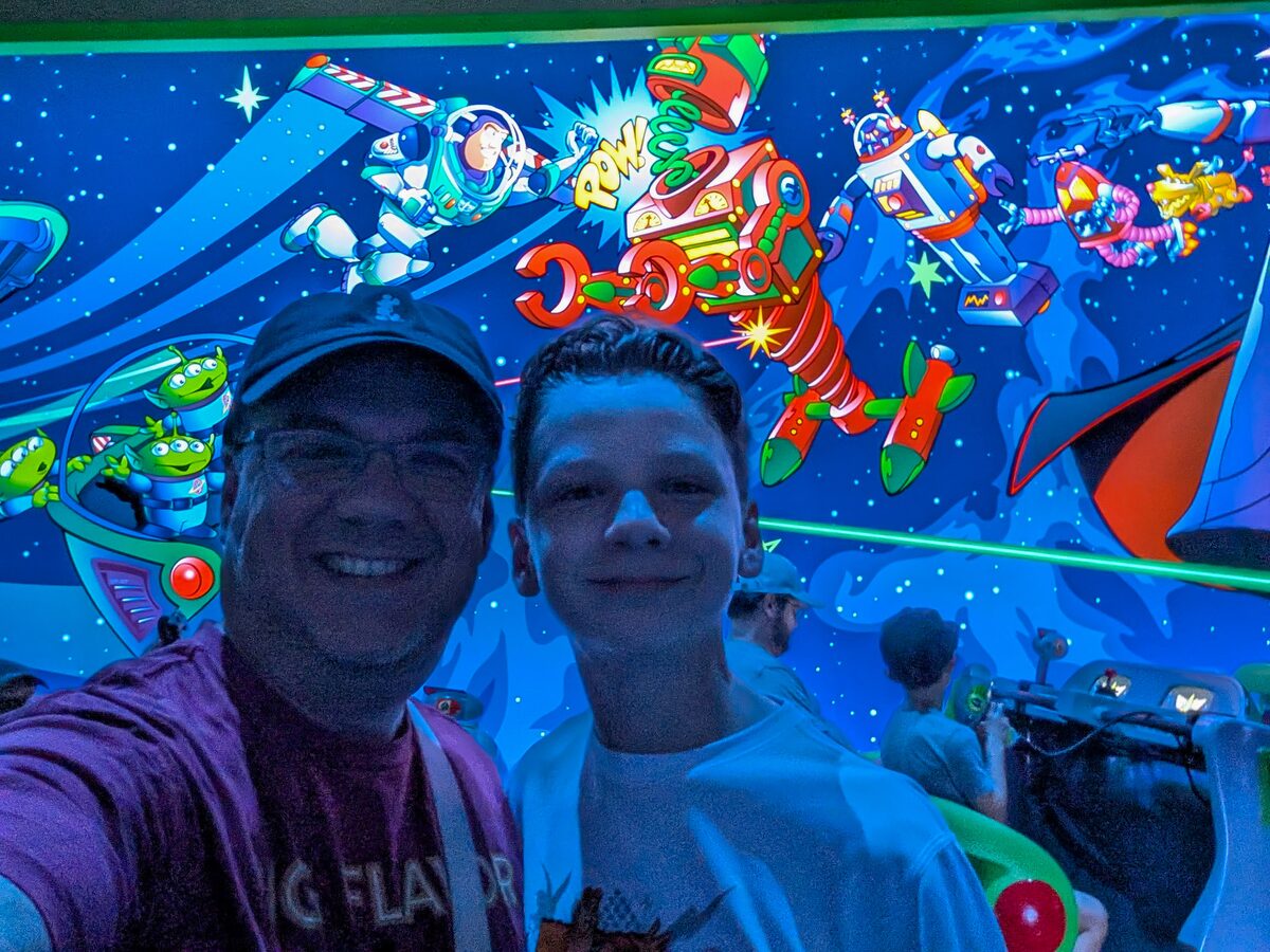 Buzz Lightyear queue black-light selfie